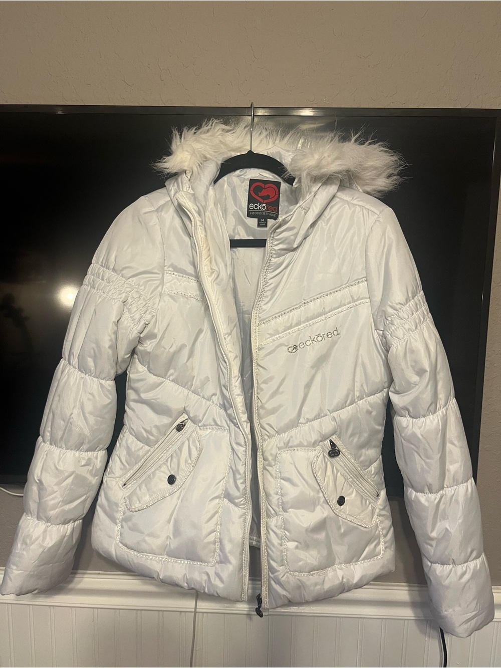 Ecko Unlimited White Quilted Puffer Jacket with Fur Hood and diamond studs